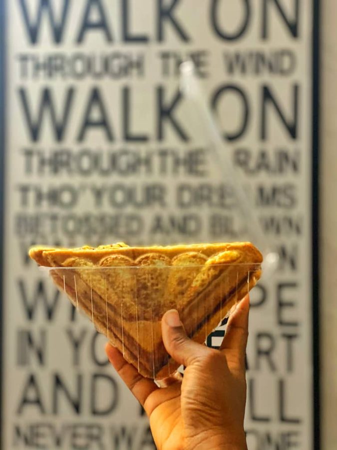 Sandwich toast held up